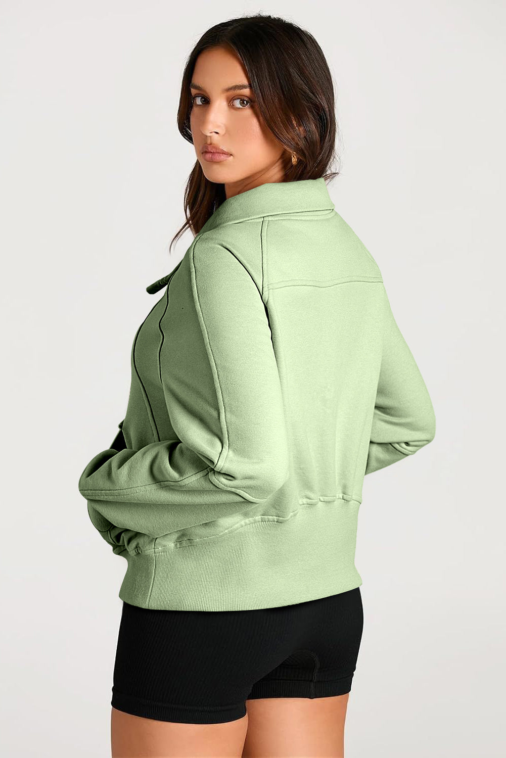 Smoke green sweatshirt with kangaroo pocket and stand-up collar with quarter zip