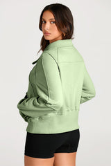 Smoke green sweatshirt with kangaroo pocket and stand-up collar with quarter zip