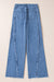 Jeans acampanados con dobladillo crudo con costuras vintage hermosa azul