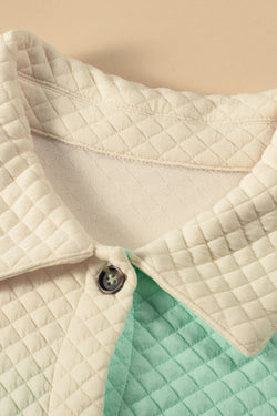 Green quilted jacket with flap pocket and color block patchwork