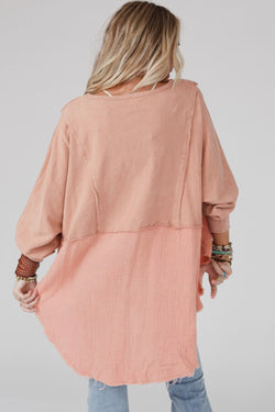 High and low oversized blouse with raw hem and crumpled sparse