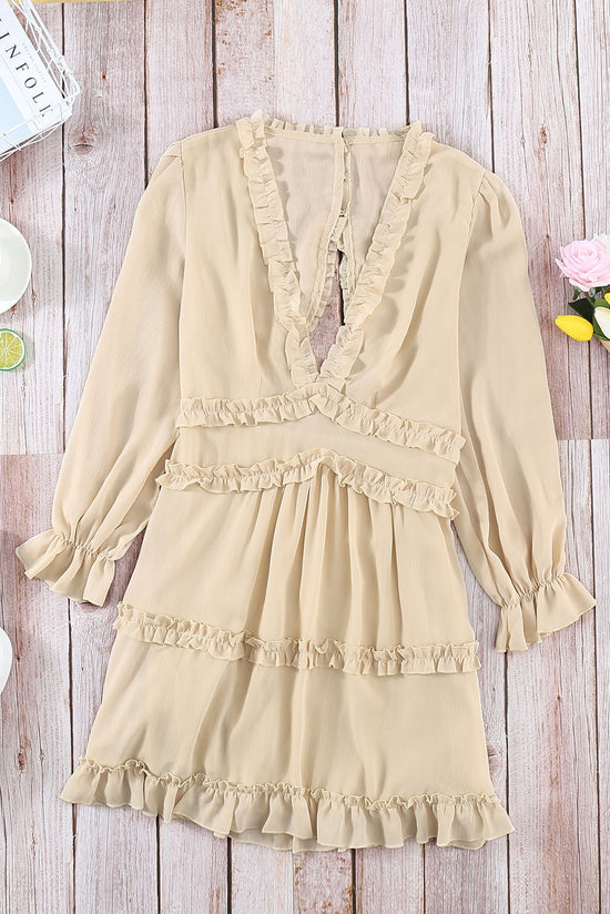 Vestido beige con volcado V -neck y abre atrás