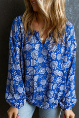 Chemisier bleu à manches longues et col en V cranté à fleurs-A WOMAN WE LOVE