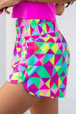 Pantalones cortos deportivos geométricos multicolores altos