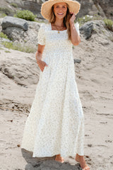 Long white dress with ruffles *