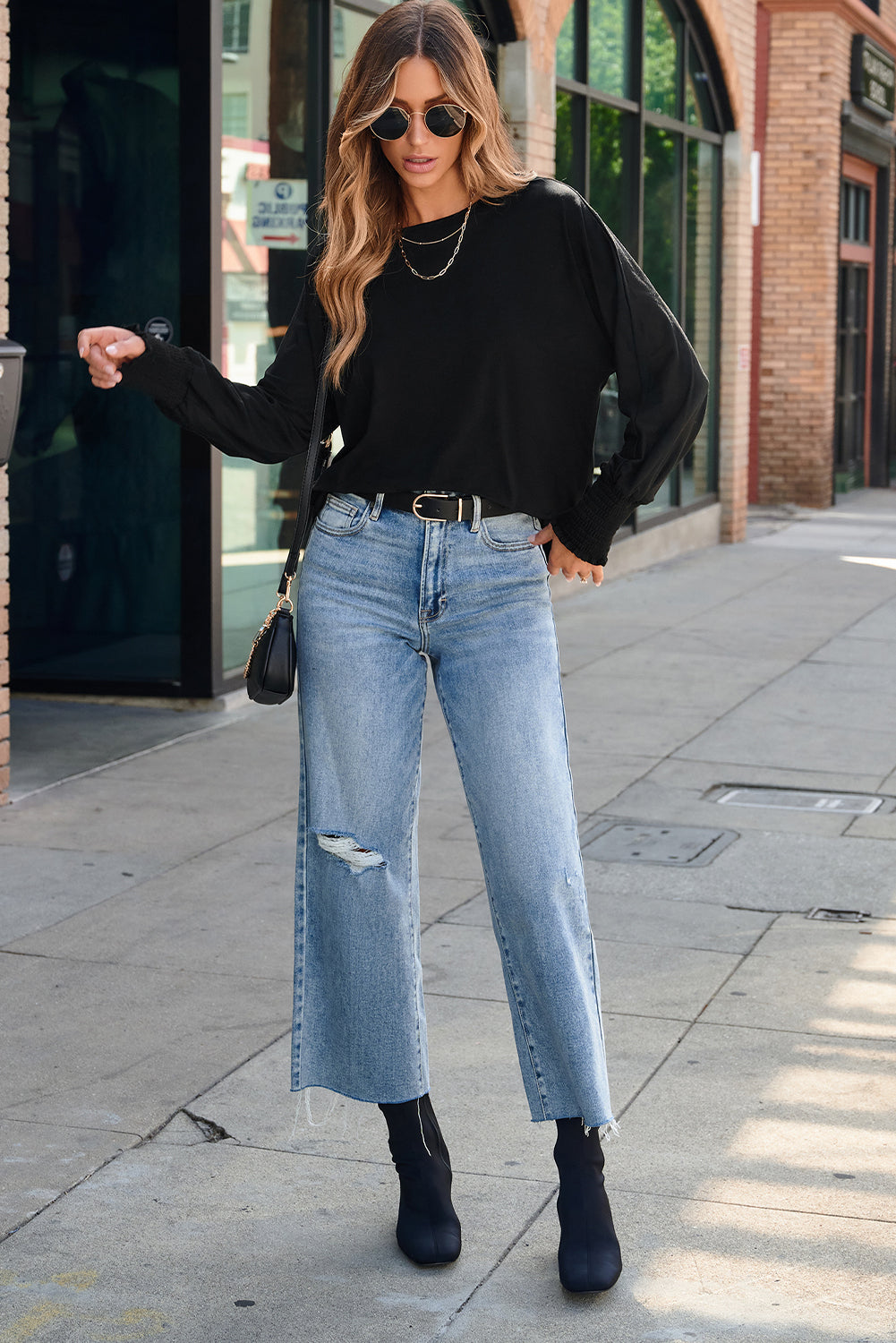 Top à manche Dolman à imprimé en marbre noir