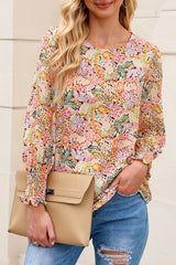 Blouse fleurie jaune à manches bouffantes-A WOMAN WE LOVE