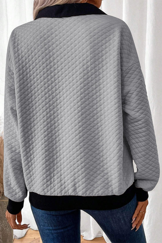 Light gray textured sweatshirt with color block edges and button-down collar