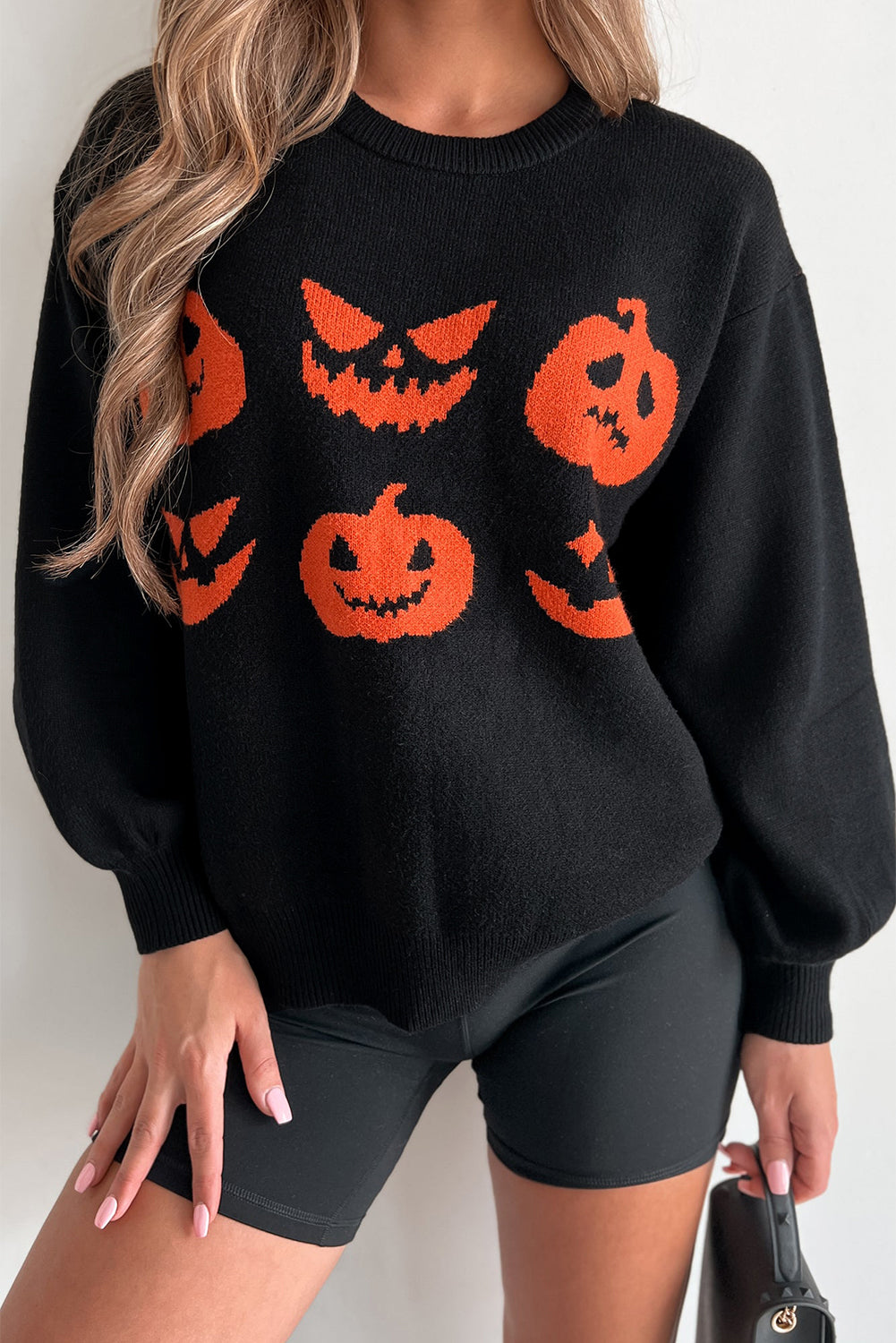 Black shoulder sweater and Halloween pumpkin face pattern