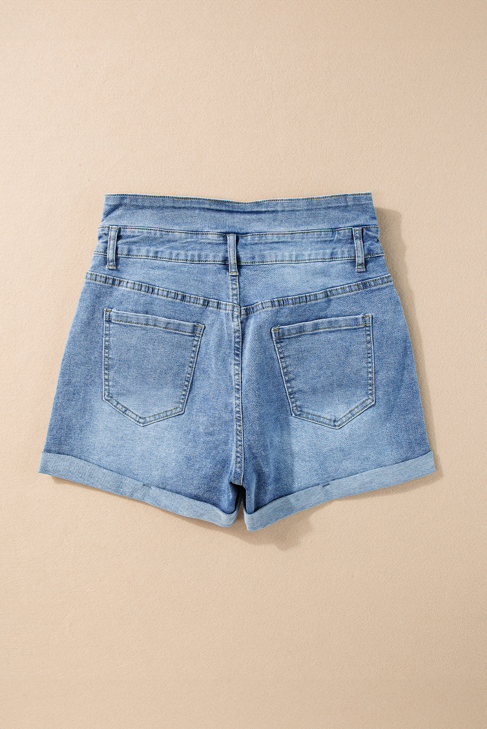 Short en jean taille haute bleu crépuscule avec braguette boutonnée et bords roulés