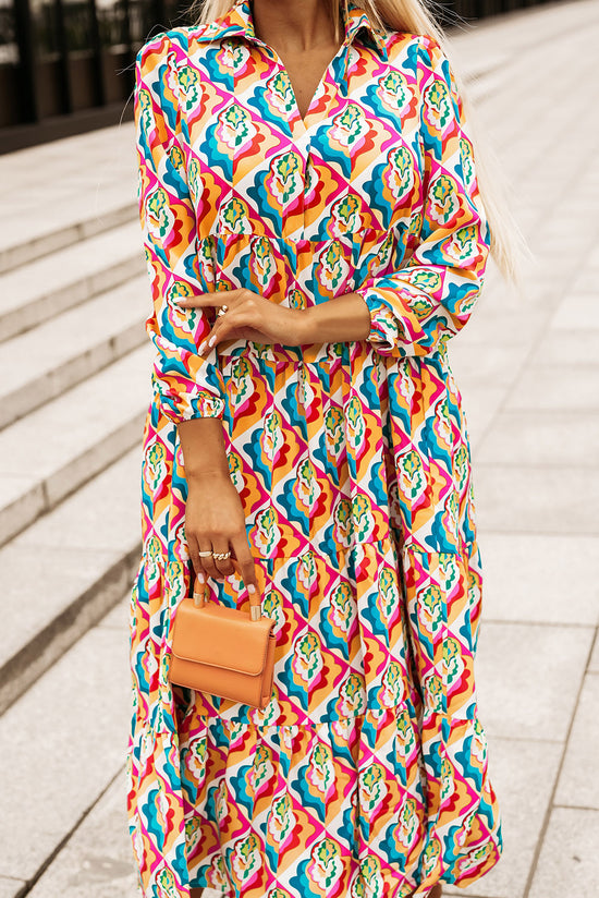 High waisted dress with long sleeves and multi-colored abstract geometric print