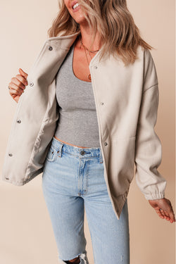 Beige bomber jacket with pockets and baseball collar