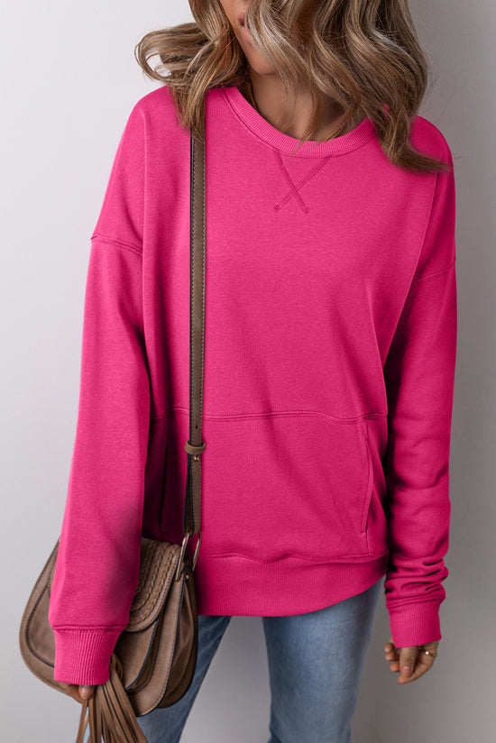 Ample sweatshirt with pockets and crossed seams *