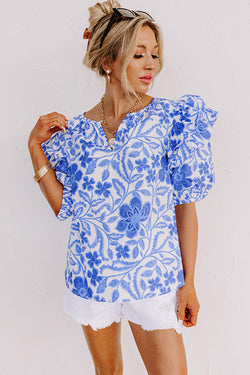 Blusa azul oscuro con estampado floral *