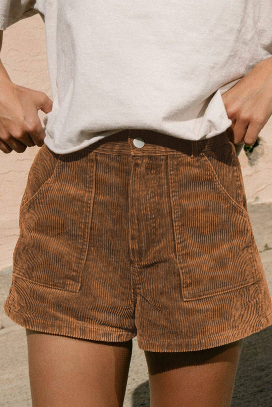 Vintage brown corduroy shorts with elastic waist and back pockets