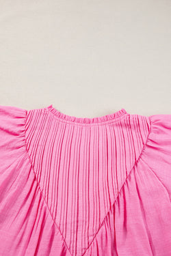 Blouse in floating gauze textured pink lively pink with split collar and patchwork