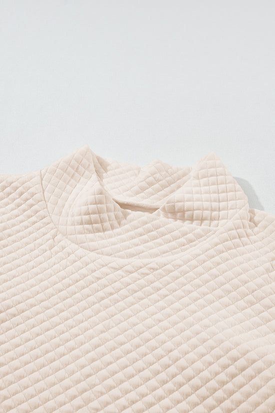 Apricot quilted sweatshirt with stand-up collar and kangaroo pocket