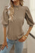 High textured vintage with puffy sleeves and Simply Taupe upright collar