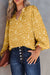 Crushed yellow printed blouse with split collar and fall