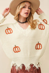 Pull ample beige en tricot torsadé avec ourlet brut et col en V