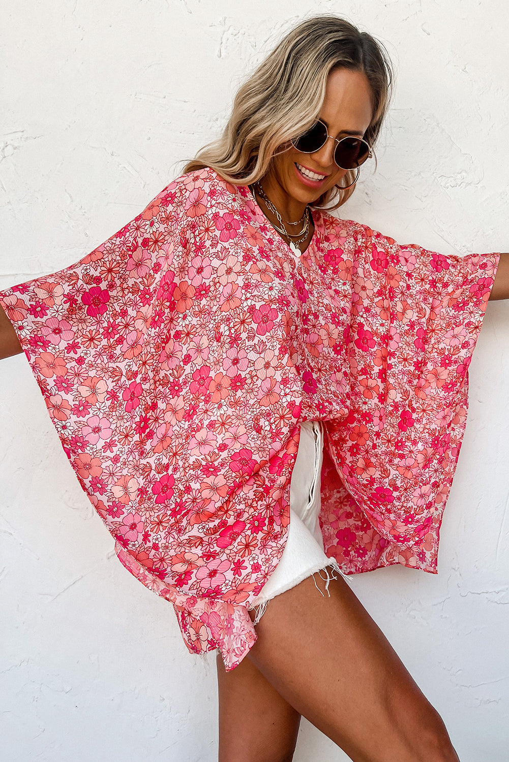 Chemisier style kimono rose à col en V et motif floral bohème