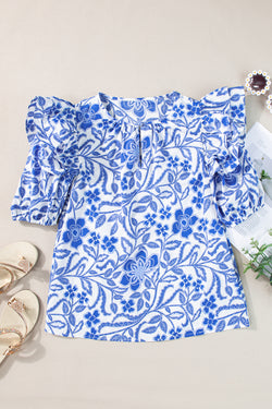 Blusa azul oscuro con estampado floral *