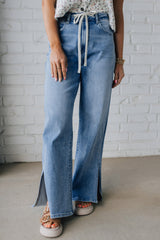 Jean à taille haute avec cordon de serrage bleu