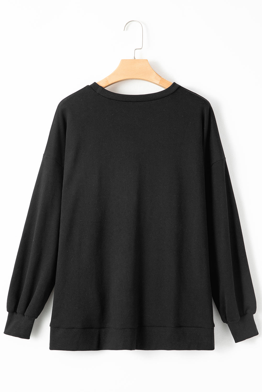 Sweat-shirt noir uni à col rond et ourlet haut et bas