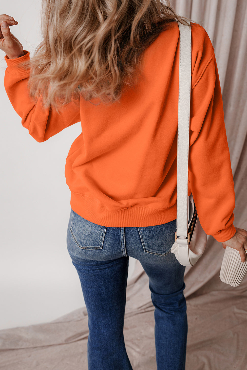 Sweat-shirt en tissu éponge à épaules tombantes et doublure en polaire uni orange roux