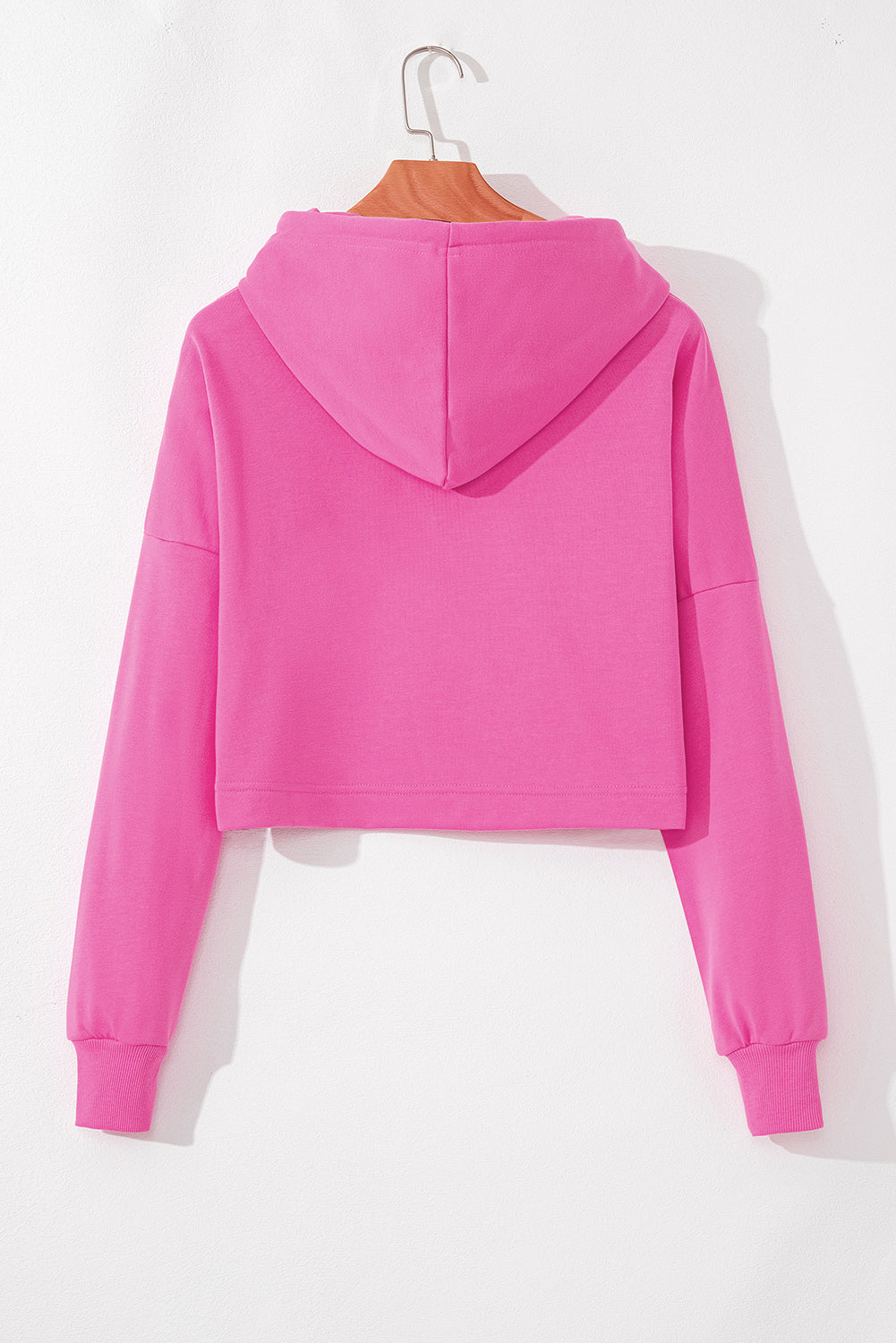 Sweat à capuche court à cordon de serrage uni rose *