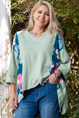 Large top green top in patchwork of flowers