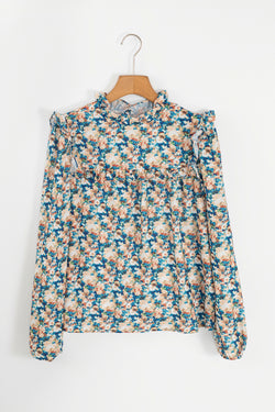 Blusa azul cielo con mangas hinchadas *