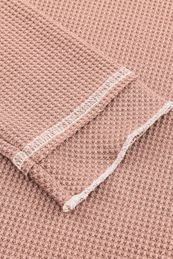 Long -sleeved textured high and apricot pink round pink neck *