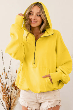 Yellow zip-up hoodie with kangaroo pocket and ribbed trim