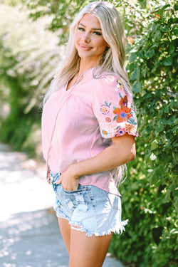 Pink blouse with embroidered flowers and puffy sleeves, split collar