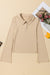 High beige buttoned collar and long sleeves, slim cut