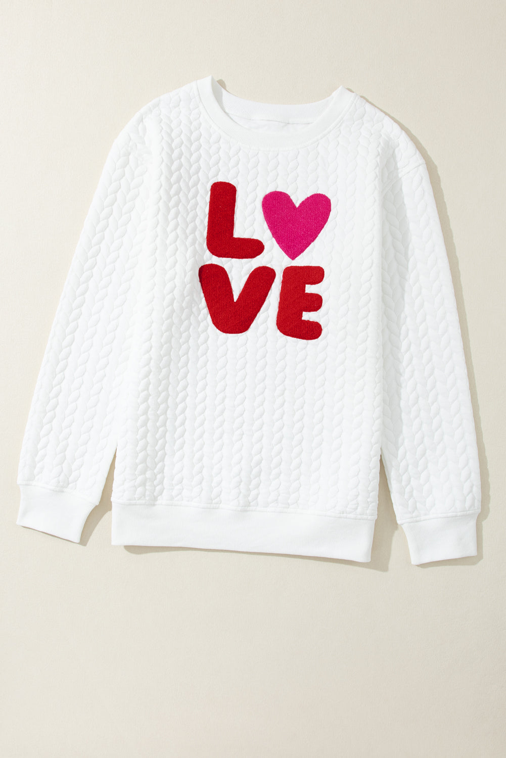 White sweatshirt in twisted knitting embroidered love caterpillar