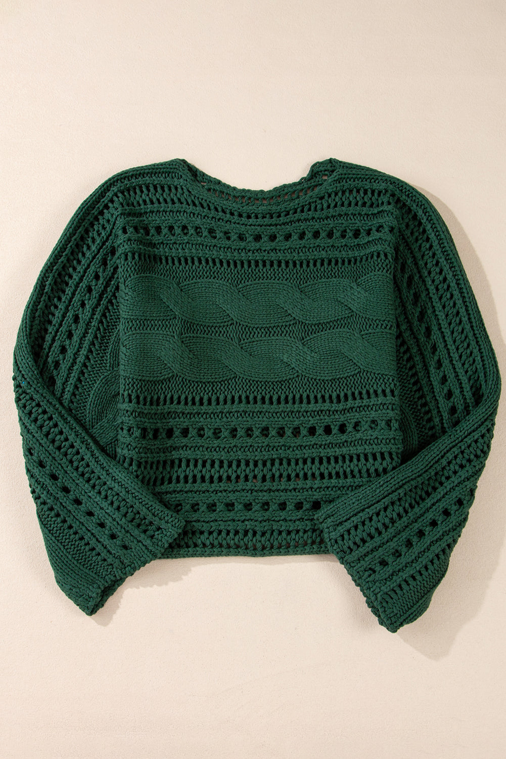 Pull court en tricot torsadé ajouré vert noirâtre