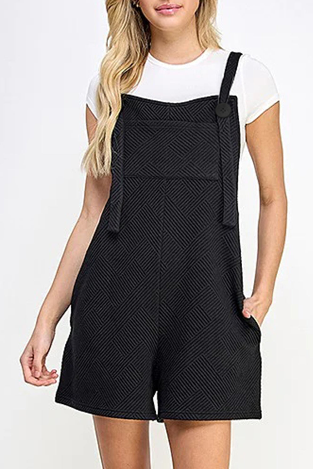 Black textured romper with adjustable straps