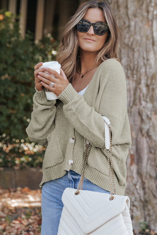 Grey sweater cardigan with front pockets and buttons