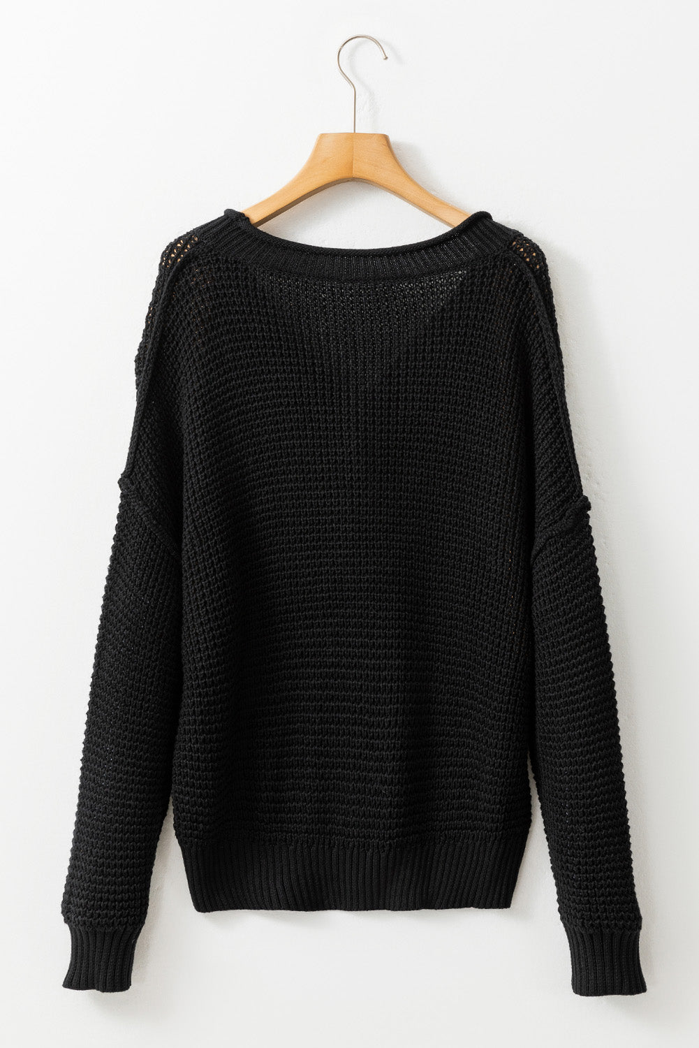 Bouton en tricot noir V Pull d'épaule de chou