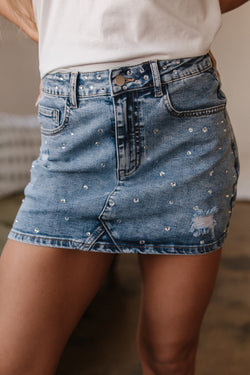 Mini-jupe taille haute en Jean effet vieilli avec strass *