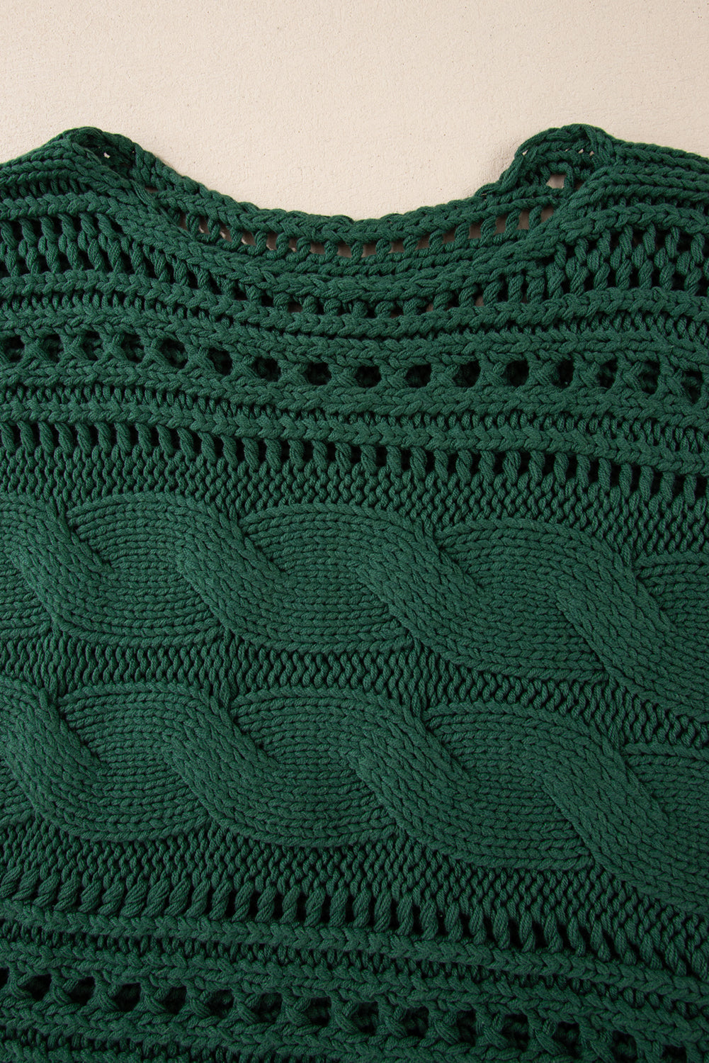 Pull court en tricot torsadé ajouré vert noirâtre