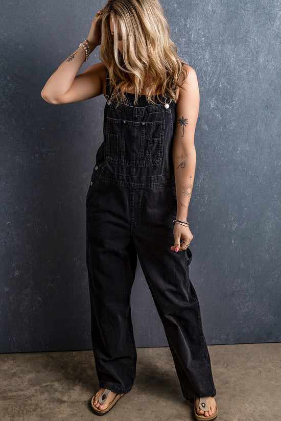 Black denim overalls with adjustable straps and multiple pockets