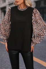 Blouse noire à contrasté-A WOMAN WE LOVE
