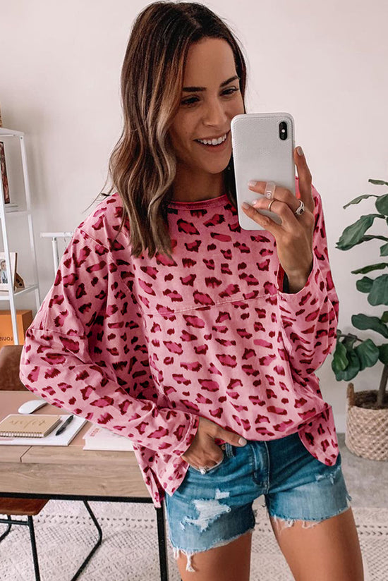 Ample with long sleeves and pink animal print