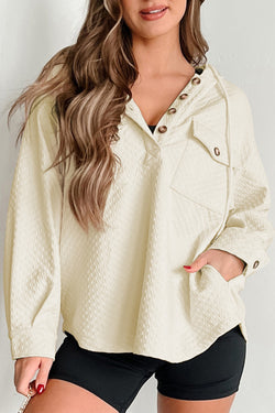 Apricot textured hoodie with button-down neckline and side pockets