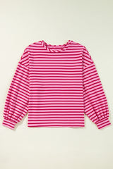 Striking pink sweatshirt and neck and falling shoulders