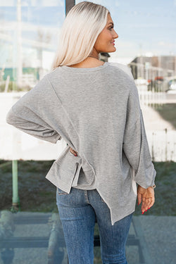 Long sleeve top with irregular hem *