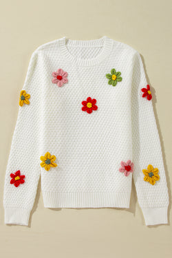 Pull en tricot texturé avec appliques de fleurs colorées blanches